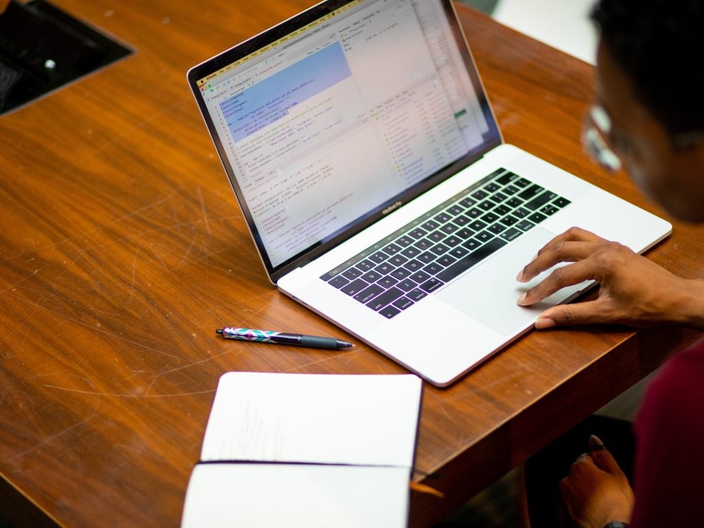 Professor working on a computer